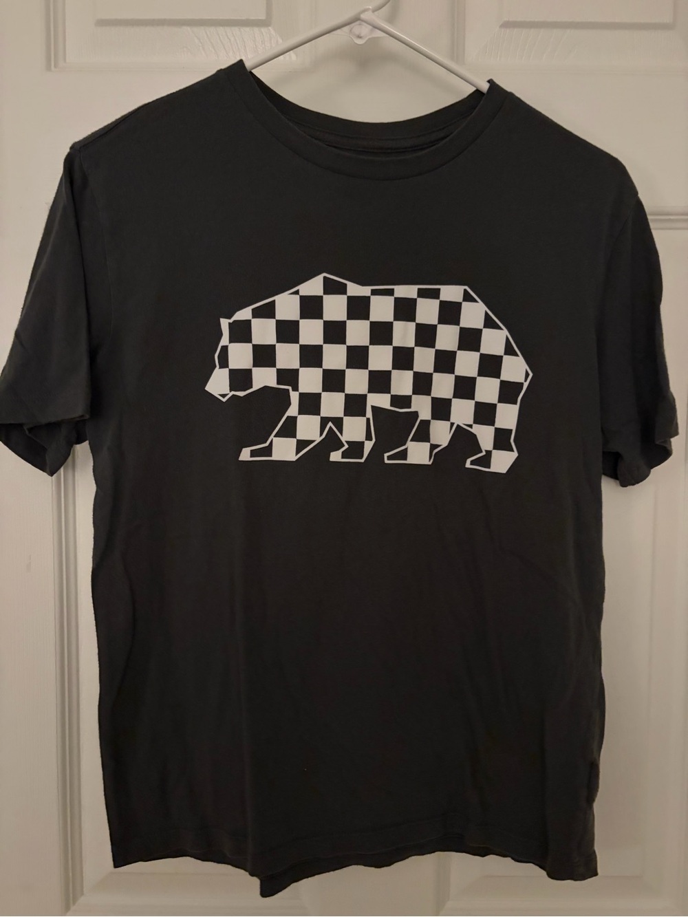 Old Navy Black Tee with White Checkerboard Bear Graphic